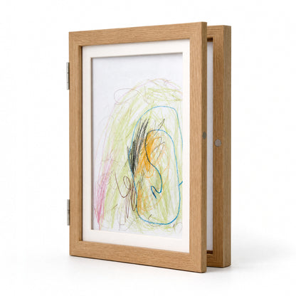 The front panel hinges on one long edge and closes on a magnet on the opposite edge