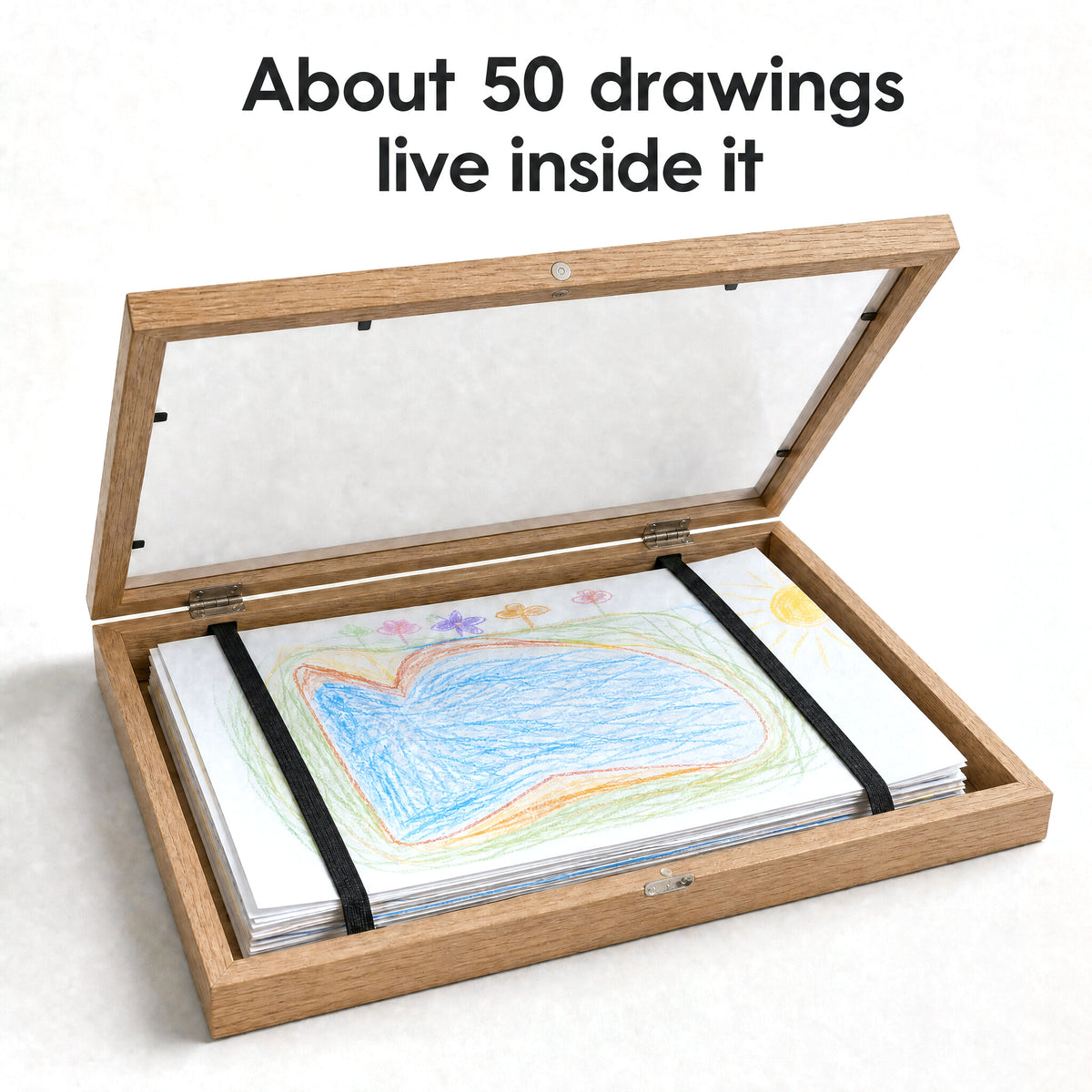 About 50 A4 drawings stacked inside the open frame under its elastic bands